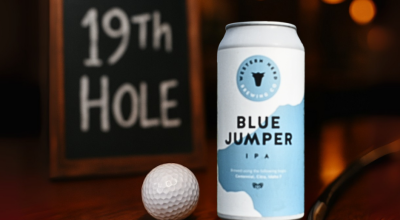 Blue Jumper IPA on the 19th hole bar with putter and golf ball